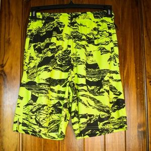 Neon/black Nike athletic shorts (medium).